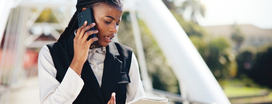 An event planner makes a phone call during a busy, multi-day event.