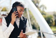 An event planner makes a phone call during a busy, multi-day event.